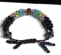 The multicolor flowers of the garden bracelet, handmade kumihimo wrislet, woman size, yellow,green,blue,pink,iris mix beads, macrame clasp,