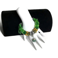 Green bracelet, Handmade green beaded Kumihimo wrap, woman size, macrame clasp, Boho-chic, The green mix bracelet