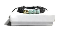 THE GOLDEN ELEPHANT DIFFUSER BRACELET, black lava rocks with green amazonite stones, macramê clasp, memory wire, woman's size, essential oil diffuser,
