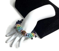 The multicolor flowers of the garden bracelet, handmade kumihimo wrislet, woman size, yellow,green,blue,pink,iris mix beads, macrame clasp,