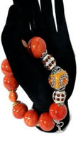 Orange ceramic beads stretch bracelet, handmade bracelet, Elaini Arthur bracelet collection, The orange bracelet