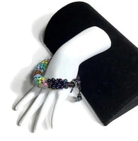 The multicolor flowers of the garden bracelet, handmade kumihimo wrislet, woman size, yellow,green,blue,pink,iris mix beads, macrame clasp,