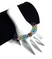 The multicolor flowers of the garden bracelet, handmade kumihimo wrislet, woman size, yellow,green,blue,pink,iris mix beads, macrame clasp,