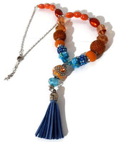 Blue leather tassel, statement beaded necklace, handmade necklace, boho chic style, The orange peacock necklace.
